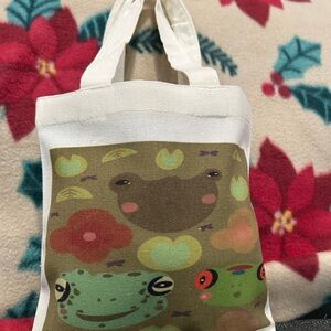 3 Cute Frogs In A Pond Tote Bag: Original Artwork